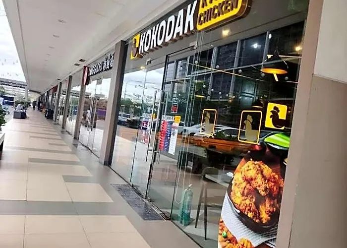 Отель Shawnalyn Condo-tel At Mall Of Philippines