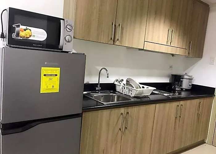 Отель Shawnalyn Condo-tel At Mall Of Philippines 4*