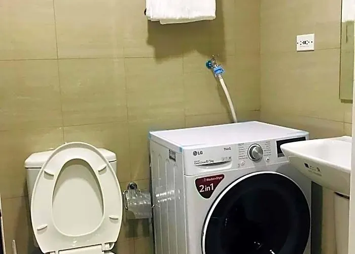 Отель Shawnalyn Condo-tel At Mall Of Philippines